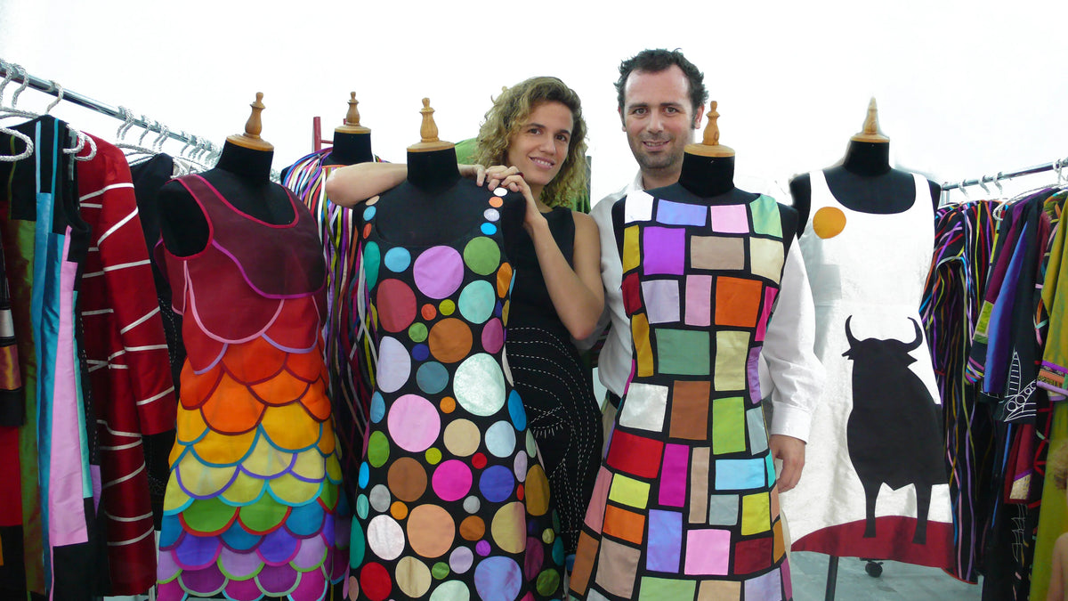 Laura Fontan and Diego Cortizas among rails of hand-painted dresses