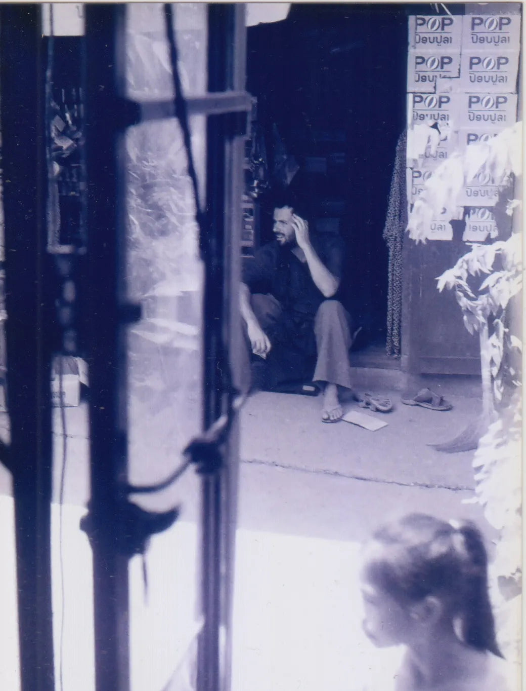 Diego Cortizas in a Hanoi shop doorway during his first years in Vietnam