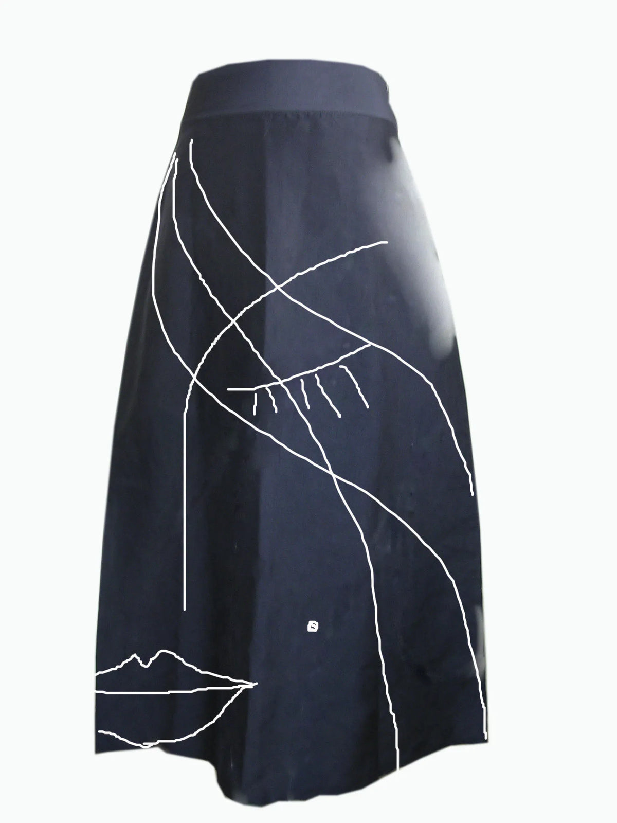 Navy skirt drawn in white line with a face and a parasol, an early Diego Cortizas design