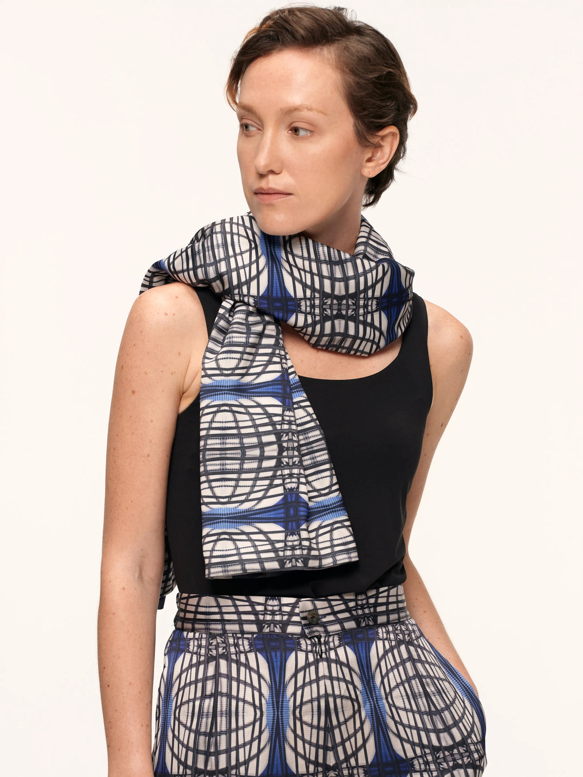 New York Iron Bolero worn long over one shoulder